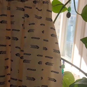 High waisted arrow skirt